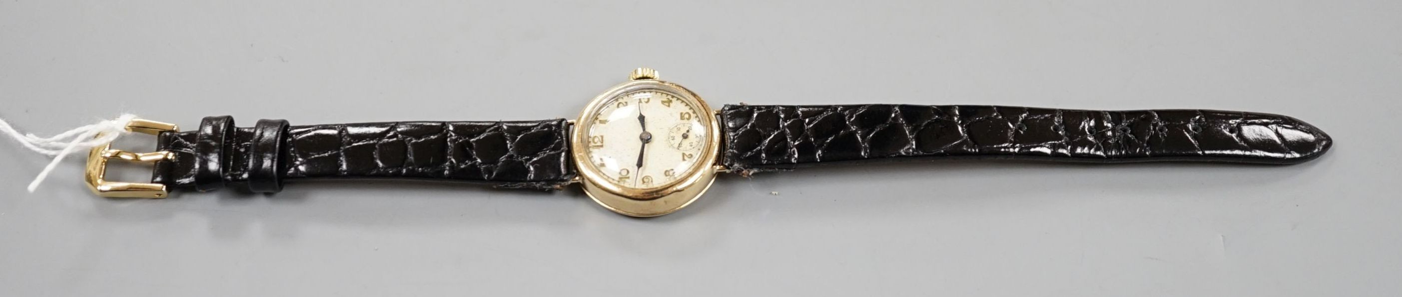 A lady's early to mid 20th century 9ct gold manual wind wrist watch, on later leather strap